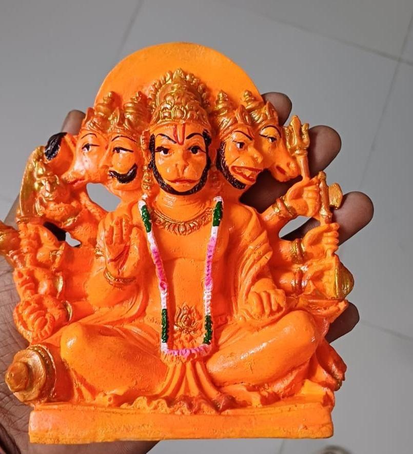 Handheld Panchmukhi Hanuman statue showcasing its compact size and detailed features, ideal for pooja and home decor.