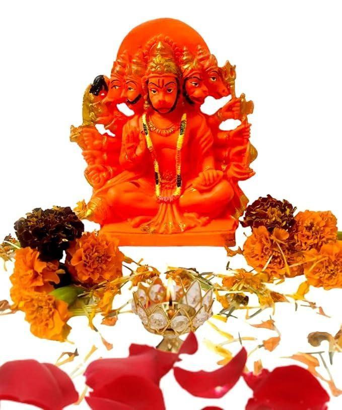 Panchmukhi Hanuman statue surrounded by marigold flowers and a diya, perfect for pooja and festive spiritual setups.